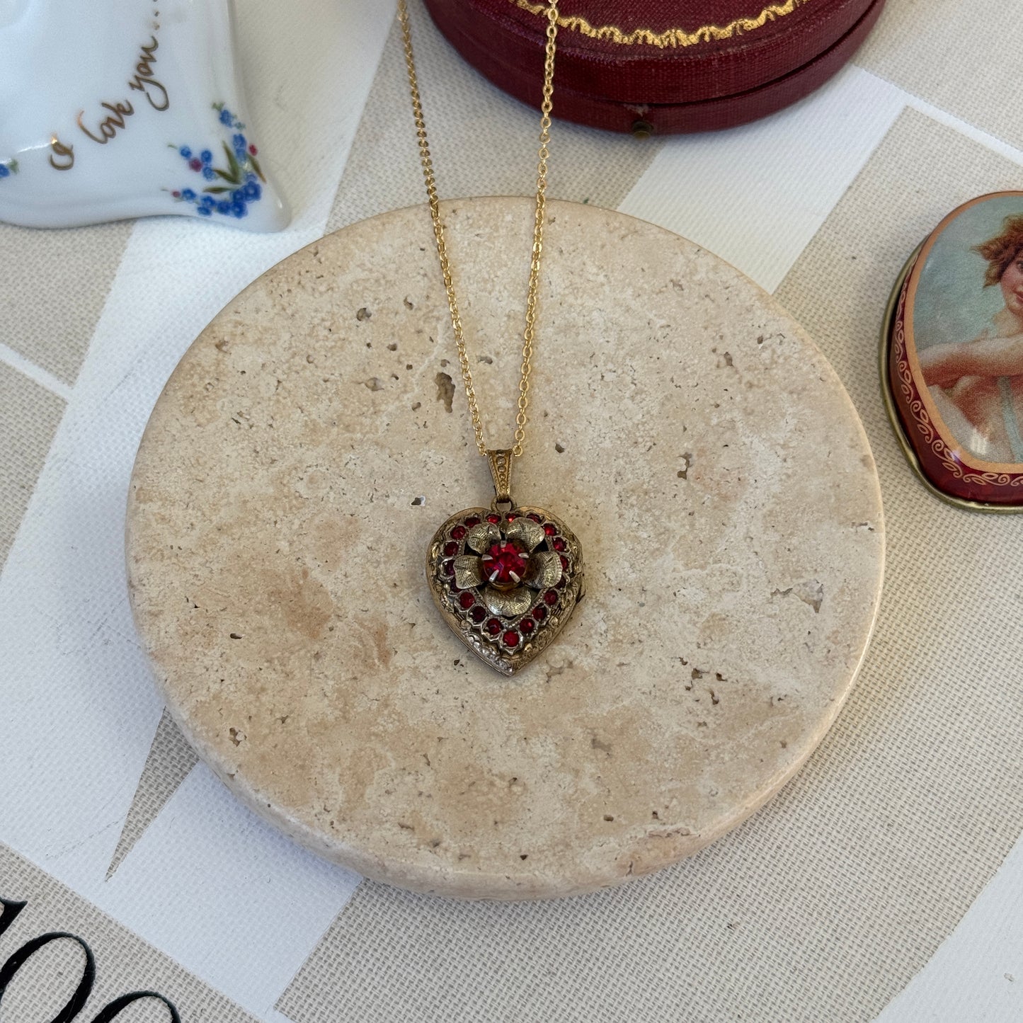 GARNET FLOWER HEART LOCKET