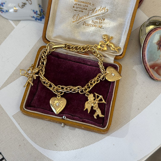 CHERUB AND HEART CHARM BRACELET