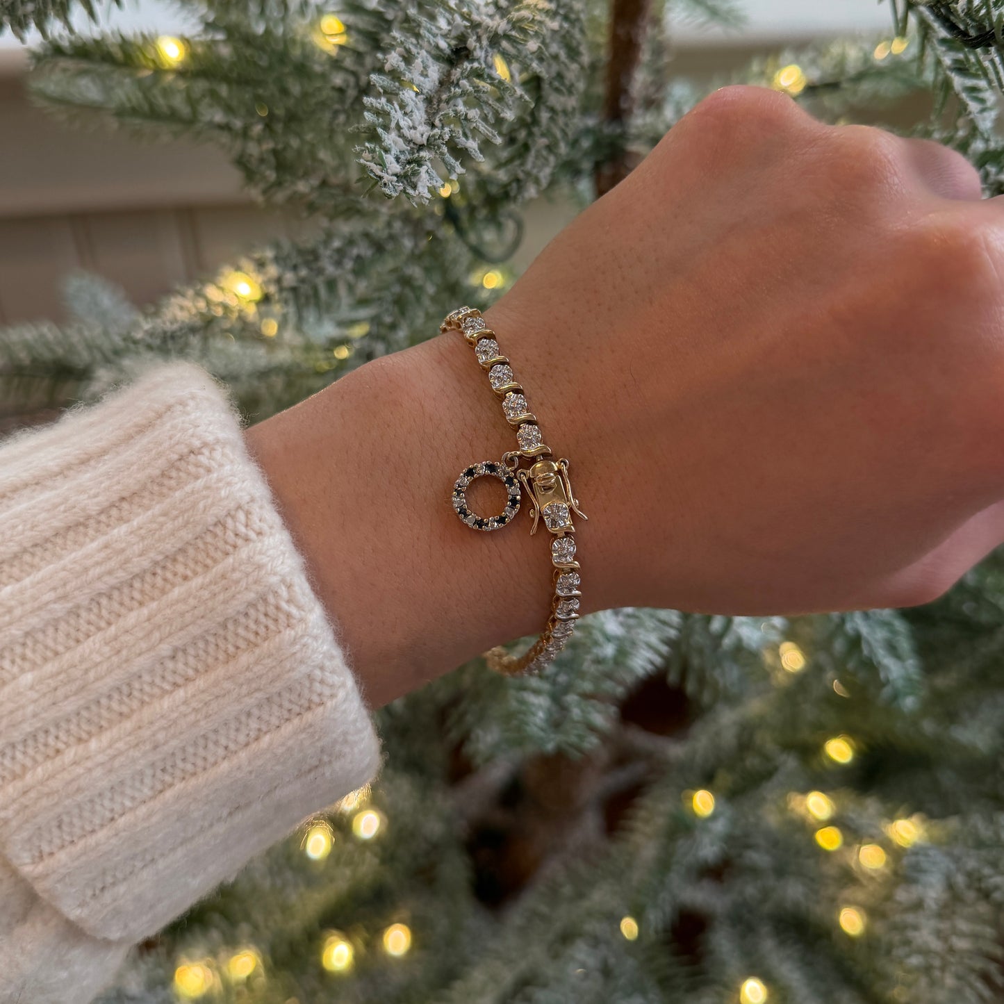 Diamond-Chip-S-Link-Tennis-Bracelet-with-Sapphire-Dangle-Charm